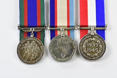 Lot 1572 - Three WWII Service Medals comprising an...