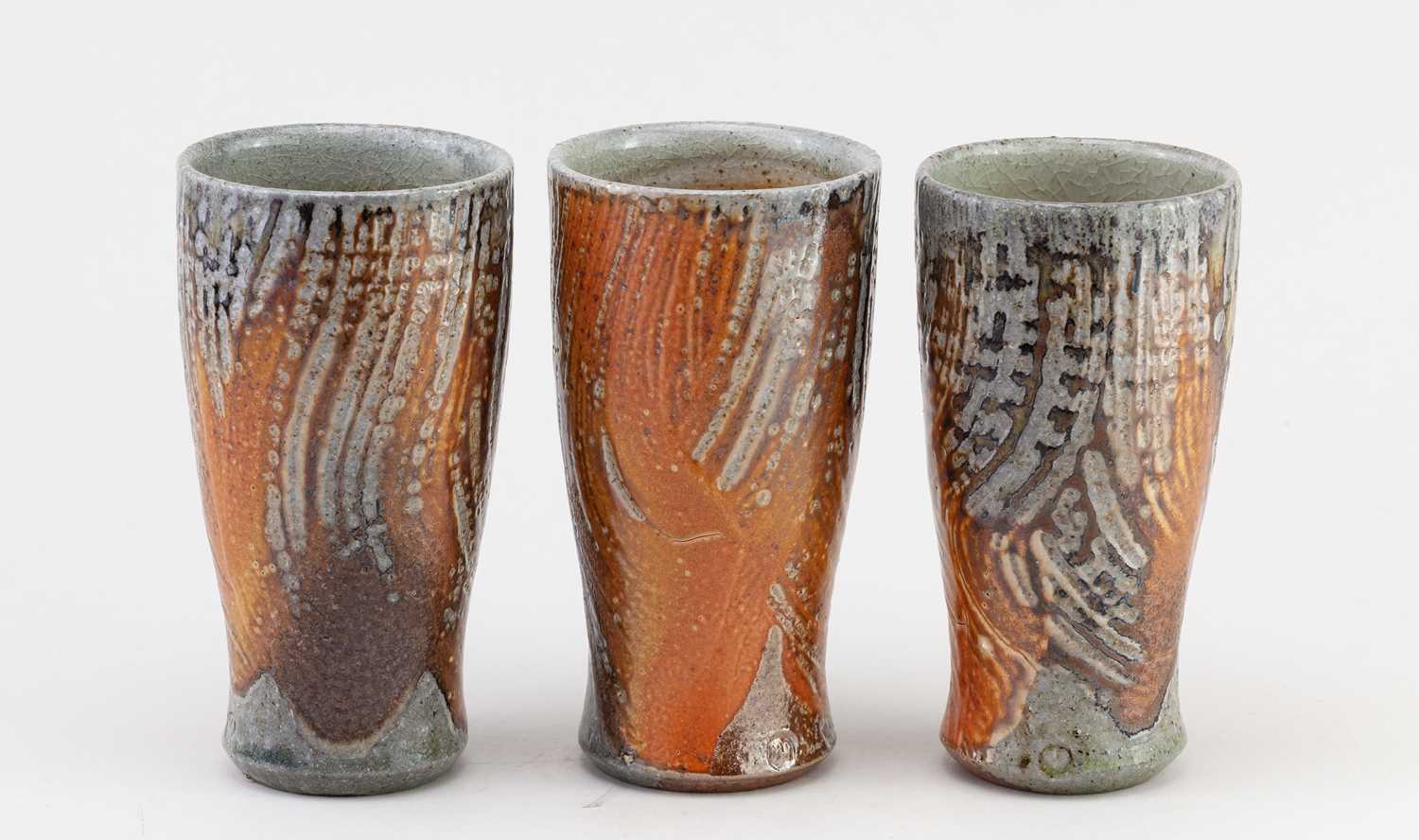 Lot 372 - Maze Hill Pottery; a trio of tall stoneware...