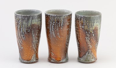 Lot 372 - Maze Hill Pottery; a trio of tall stoneware...