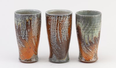 Lot 372 - Maze Hill Pottery; a trio of tall stoneware...