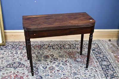 Lot 120 - A 19th century mahogany fold-over tea table,...