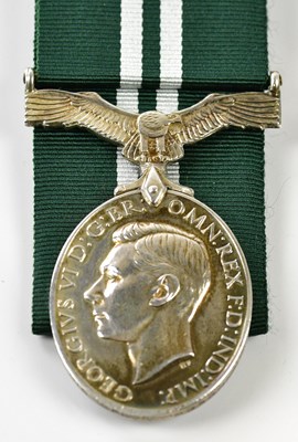 Lot 1573 - A George VI Air Efficiency Award, with...