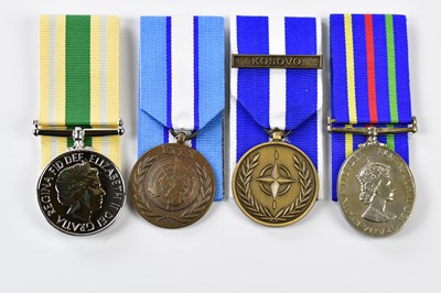 Lot 1576 - Four Elizabeth II Service Medals comprising a...