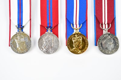 Lot 1577 - Three Elizabeth II medals relating to the...