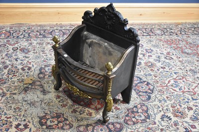 Lot 392 - A cast iron fire basket, height 63cm.