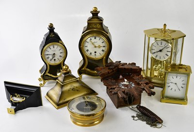 Lot 2146 - A collection of six modern clocks, to include...