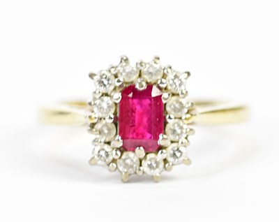 Lot 148 - An 18ct yellow gold diamond and ruby set dress...