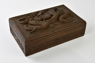 Lot 1272 - A Chinese hardwood carved box with stylised...