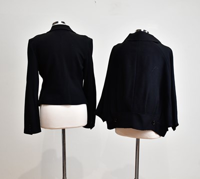 Lot 891 - DOLCE & GABANNA; two black wool short fitted...