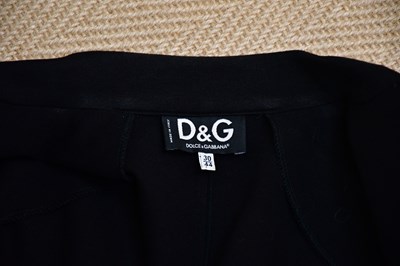 Lot 891 - DOLCE & GABANNA; two black wool short fitted...