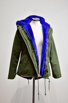 Lot 906 - MO OMO OKONG; a khaki cotton jacket with hood...