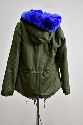 Lot 906 - MO OMO OKONG; a khaki cotton jacket with hood...