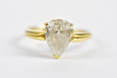 Lot 36 - An 18ct yellow gold diamond solitaire ring,...