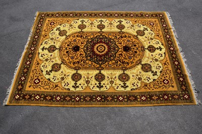 Lot 439 - A yellow ground Persian style Nahal carpet,...