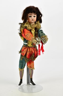 Lot 102 - An early 20th century bisque headed doll with...