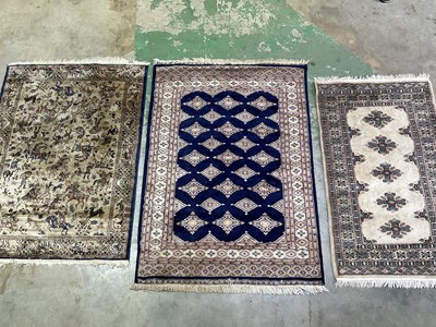 Lot 598 - A Pakistani rug, 178 x 128cm, and two further...