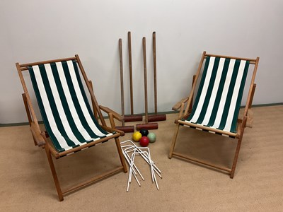 Lot 608 - A pair of deck chairs and a part croquet set