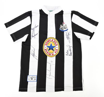 Lot 2272 - NEWCASTLE UNITED; a signed retro style...