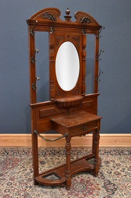Lot 13 - A Victorian carved walnut hall stand, with...