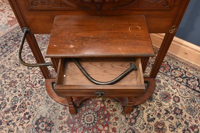 Lot 13 - A Victorian carved walnut hall stand, with...