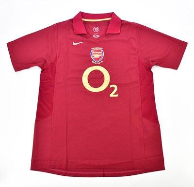 Lot 2306 - BERGKAMP; a signed Arsenal retro style...