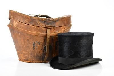 Lot 1148 - C H BAXTER; a Victorian top hat in leather case.