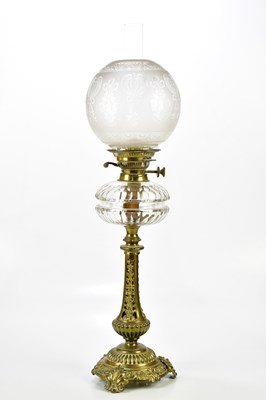 Lot 2211 - A Victorian oil lamp with etched glass shade...