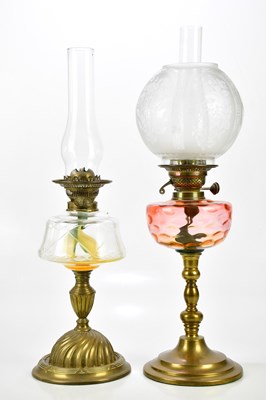 Lot 2212 - An early 20th century oil lamp, the etched...