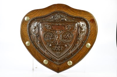 Lot 2397 - ELKINGTON & CO; a bronzed metal shield shaped...