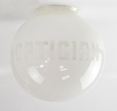 Lot 89 - An opaque white glass globe shade etched with...
