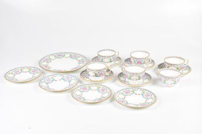 Lot 1340 - MINTONS; a floral pattern part tea service to...