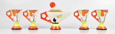 Lot 1294 - After Clarice Cliff; a modern tea set to...