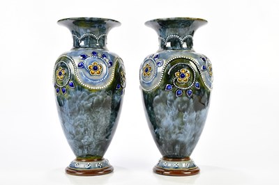 Lot 1288 - ROYAL DOULTON; a pair of Artware vases with...