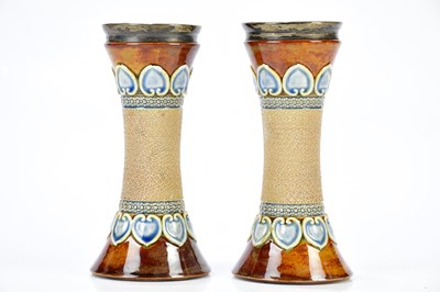 Lot 1298 - ROYAL DOULTON; a pair of waisted Artware vases,...