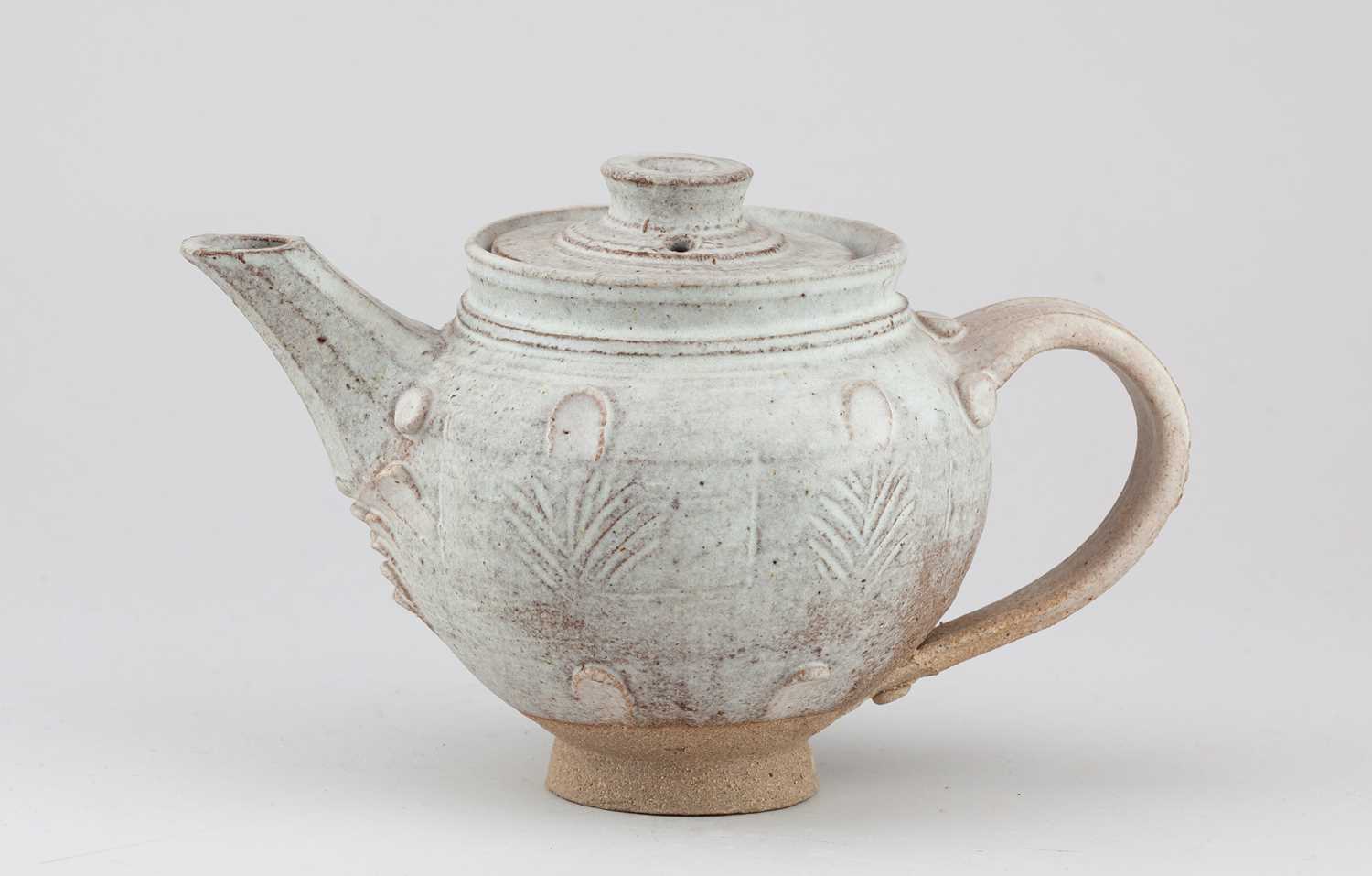 Lot 229 - IAN GODFREY (1942-1992); a stoneware teapot...