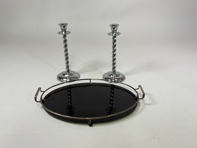 Lot 151 - An Art Deco oval black glass cocktail tray...