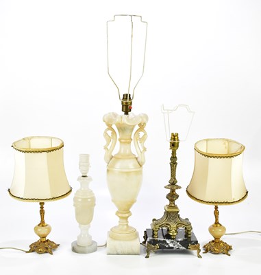 Lot 2230 - A group of five lamps to include two marble...