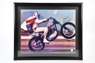 Lot 2390 - EVEL KNIEVEL; an autographed photograph of the...