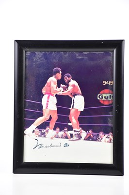 Lot 2367 - MUHAMMAD ALI; an autographed image of Muhammad...