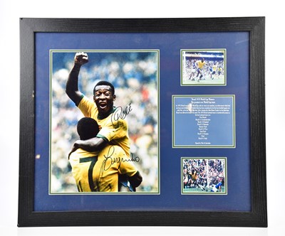 Lot 2257 - PELÉ; a photograph of Pelé celebrating with...