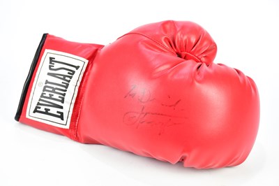 Lot 2369 - JOE FRAZIER; an autographed Everlast boxing...