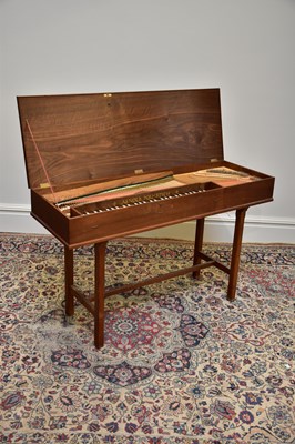 Lot 1070 - ARNOLD DOLMETSCH; a 20th century walnut cased...