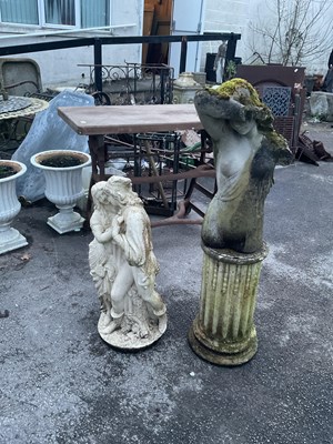 Lot 402 - A reconstituted stone statue.