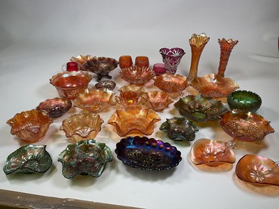 Lot 255 - A large collection of carnival glass including...