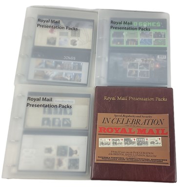 Lot 415 - Four albums of Royal Mail presentation packs...