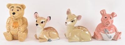 Lot 518 - A Wade 'Bambi' ceramic money box, a matching...