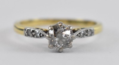 Lot 654 - An 18ct yellow gold and platinum diamond...