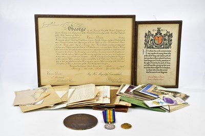 Lot 1581 - A WWI medal pair and memorial plaque awarded...