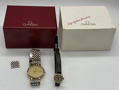 Lot 536 - OMEGA; a two toned stainless steel De Ville...