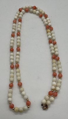 Lot 515 - A vintage coral and stained coral bead...